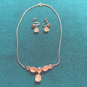Vintage 40’s-50’s rhinestone necklace with matching earrings.